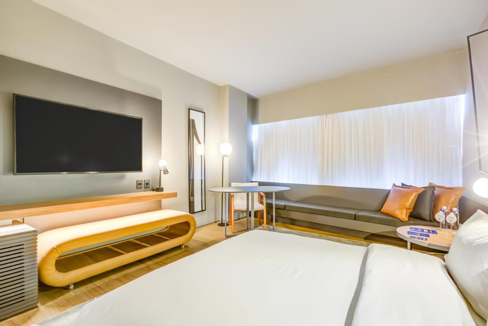Отель Doubletree By Hilton Порту-Алегри Экстерьер фото A room at the hotel